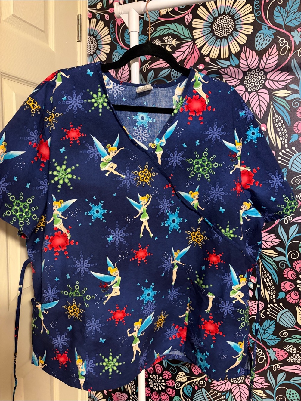 Disney Navy Blue Tinker Bell Scrub Top with Green, Red, Yellow Snow FlakeAccents